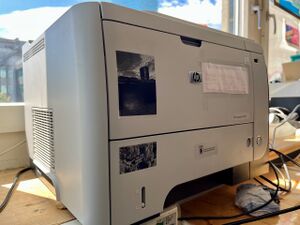 A photo of an HP LaserJet 3015P
